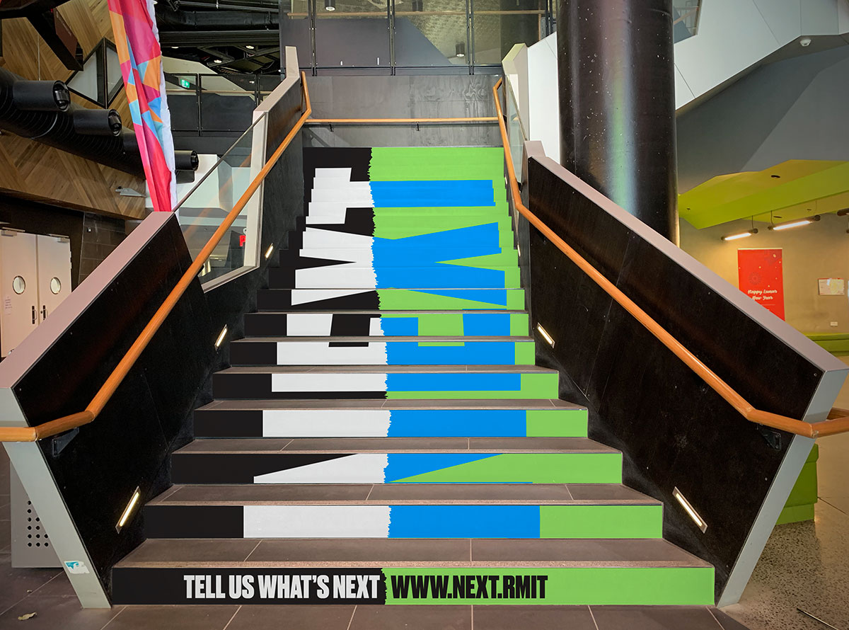 RMIT NEXT environmental branded stairs inside RMIT building | Communication Consultants | Studio Alto