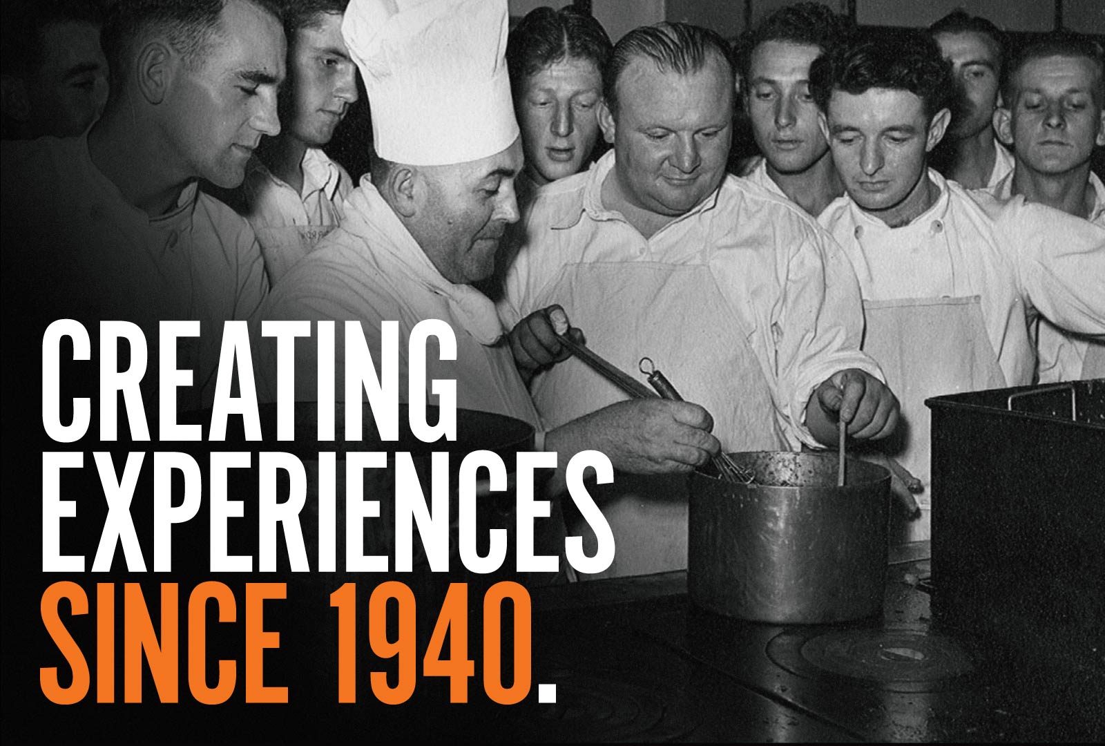 Vintage black and white photograph of a group of chefs, with a superimposed headline "Creating Experiences Since 1940"
